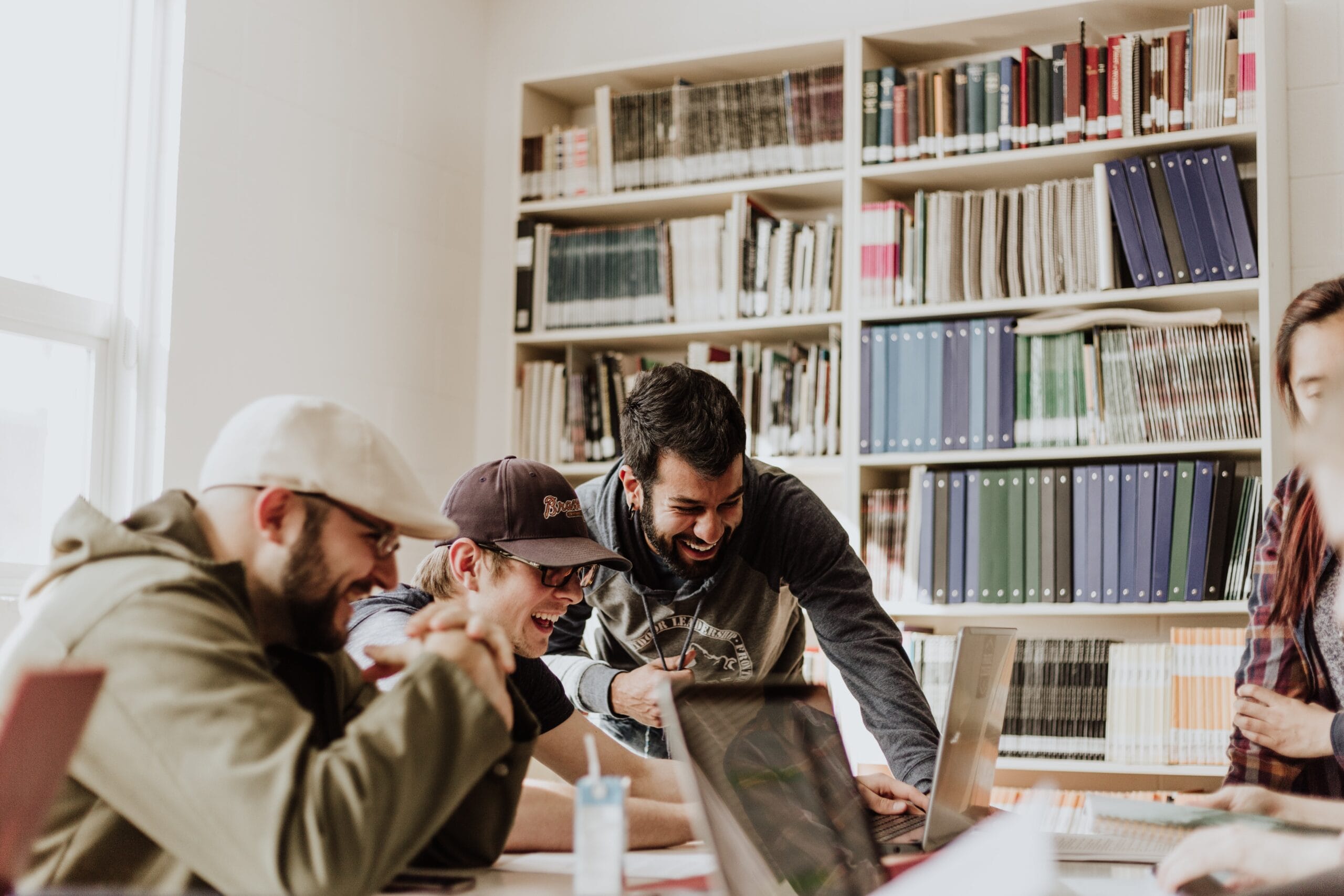 Group of colleagues collaborating on a computer