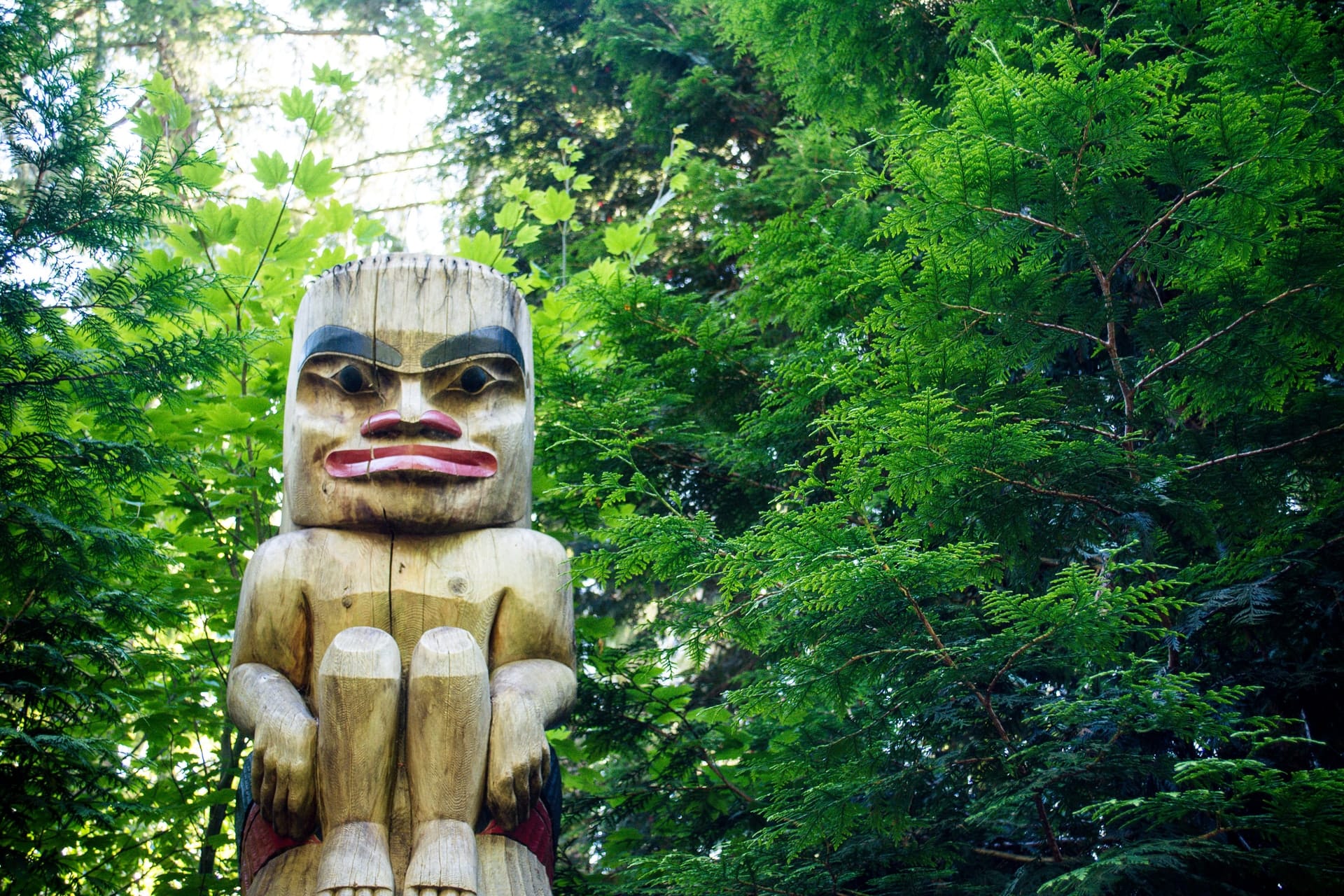 Totem pole in forest